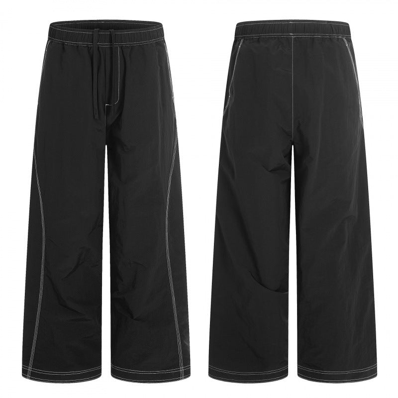 Women's wide pants with elastic waistband, drawstring and contrasting decorative seams Shop Velvia