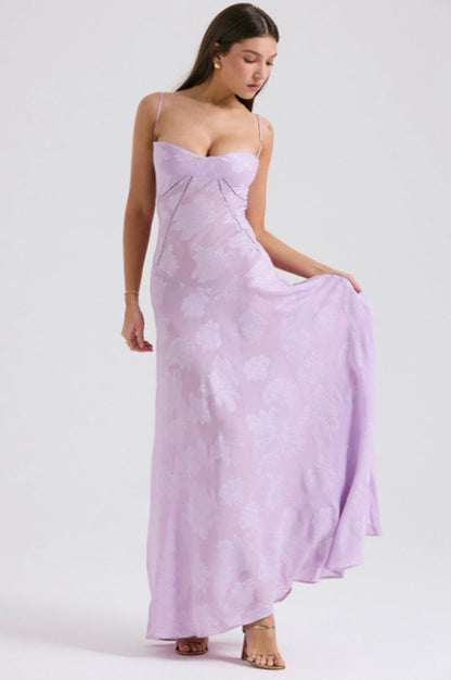 Women's figure-hugging maxi dress with bodice construction and spaghetti straps