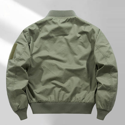 Men's short-cut lightweight bomber jacket with tactical sleeve patch and durable function shell Shop Velvia