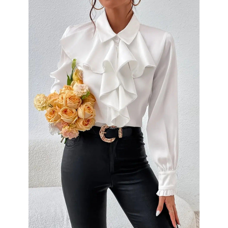 Women’s blouse with refined ruffle details and elegant sleeves