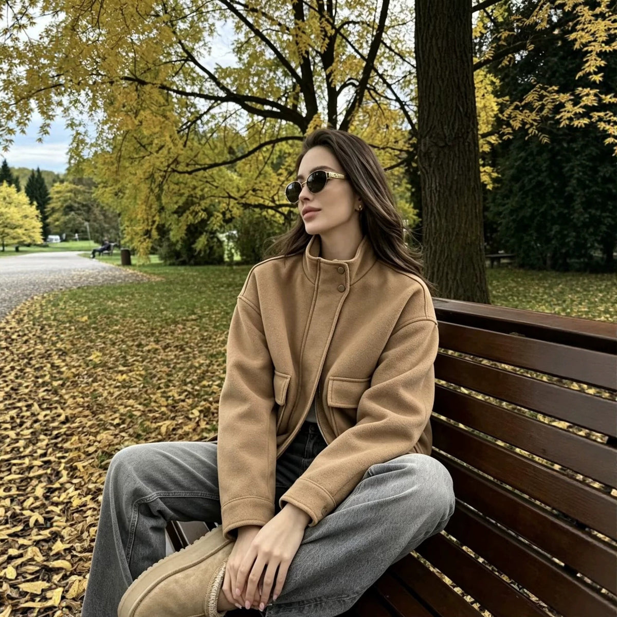 Women's wool blend blouson jacket with stand-up collar, large flap pockets, and elastic hem Shop Velvia