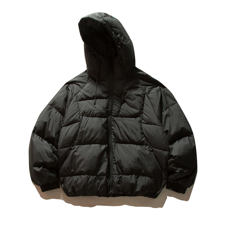Unisex Oversize quilted jacket in boxy cut with hood and adjustable hem Shop Velvia