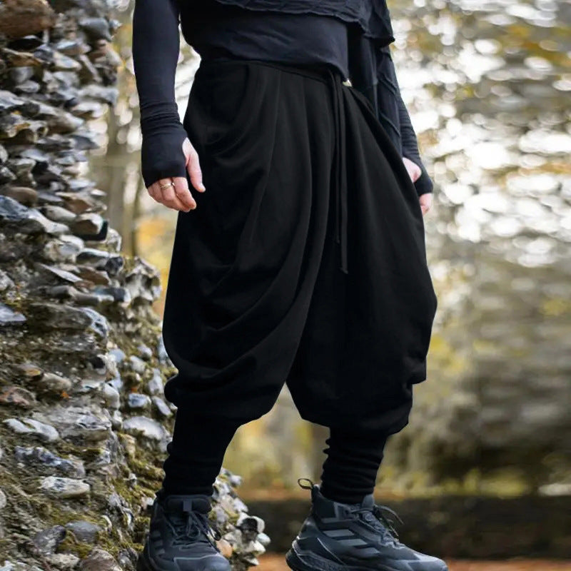 Men's nan avant-garde harem pants with wrap front, elastic waistband, and slim lower leg Shop Velvia