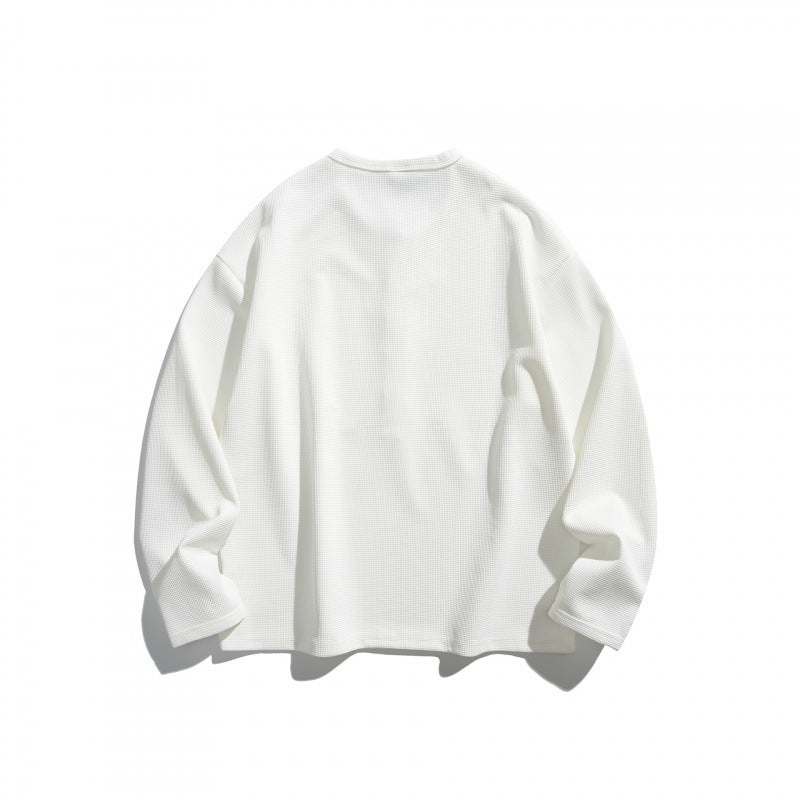 Unisex waffle texture Henley shirt with button placket and oversized fit Shop Velvia
