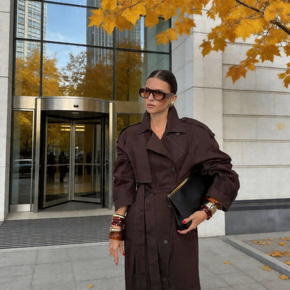 Women Longer classic trench coat with button placket, tie belt and epaulettes Shop Velvia