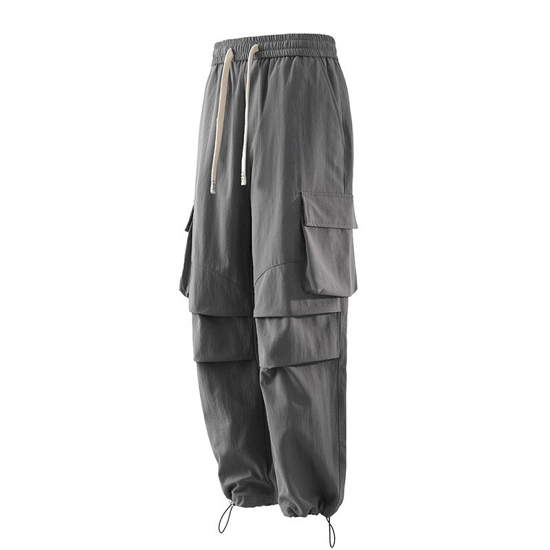 Men's cargo pants with elastic waistband, layered detail and zip hem Shop Velvia