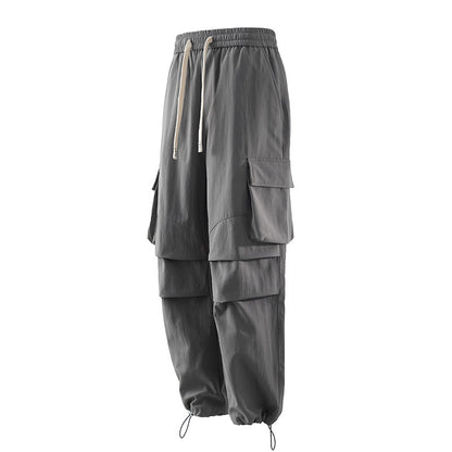 Men's cargo pants with elastic waistband, layered detail and zip hem Shop Velvia