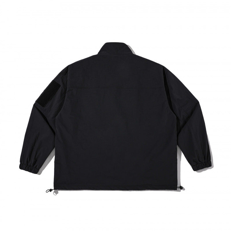 Unisex Lightweight Technical-Utility Jacket with Stand Collar, Zipper Pockets and Drawstring Hem Shop Velvia