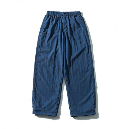 Unisex Loose Crinkle Pants with elastic drawstring waistband, drop-crotch, and side pockets Shop Velvia