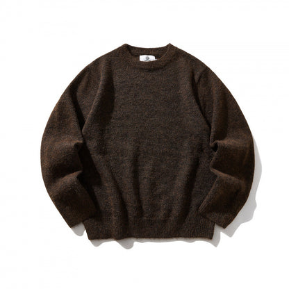Unisex Oversize fine knit sweater with round neckline, ribbed cuffs, and mottled wool blend Shop Velvia