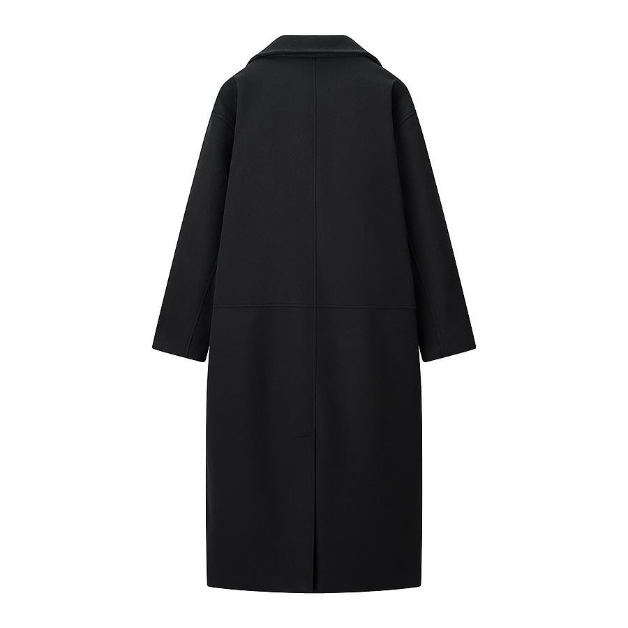 Ladies long coat in a minimalist cocoon cut made of a wool blend with double-breasted button placket Shop Velvia