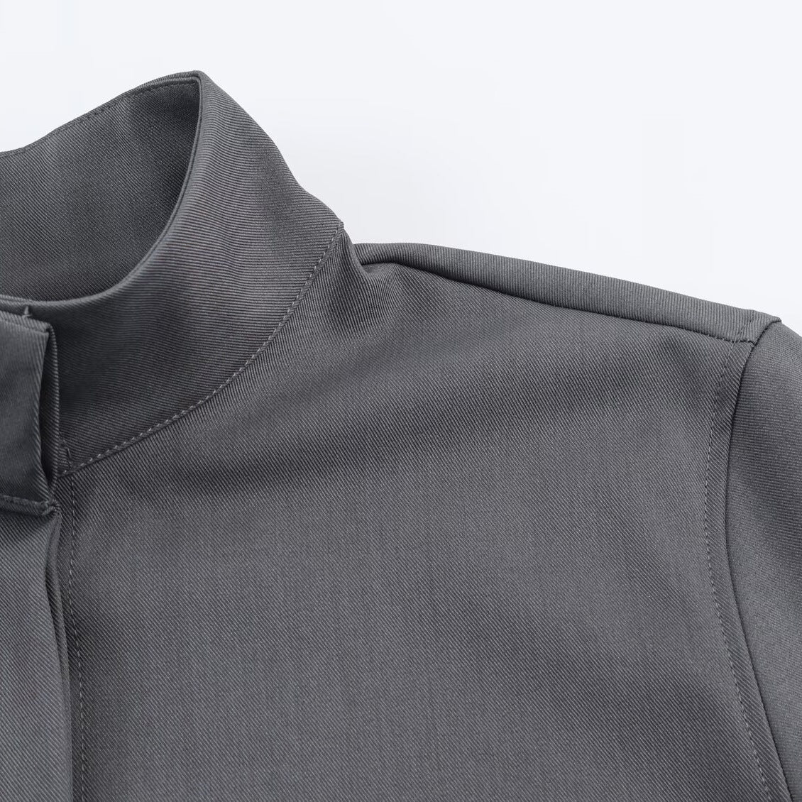 Women's loose-fitting tunic blouse with concealed button placket and stand-up collar Shop Velvia