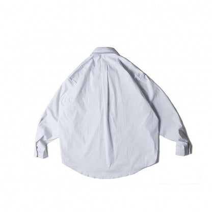 Unisex Oversize-checkered Shirt with rounded hem and appliquéd chest pockets Shop Velvia