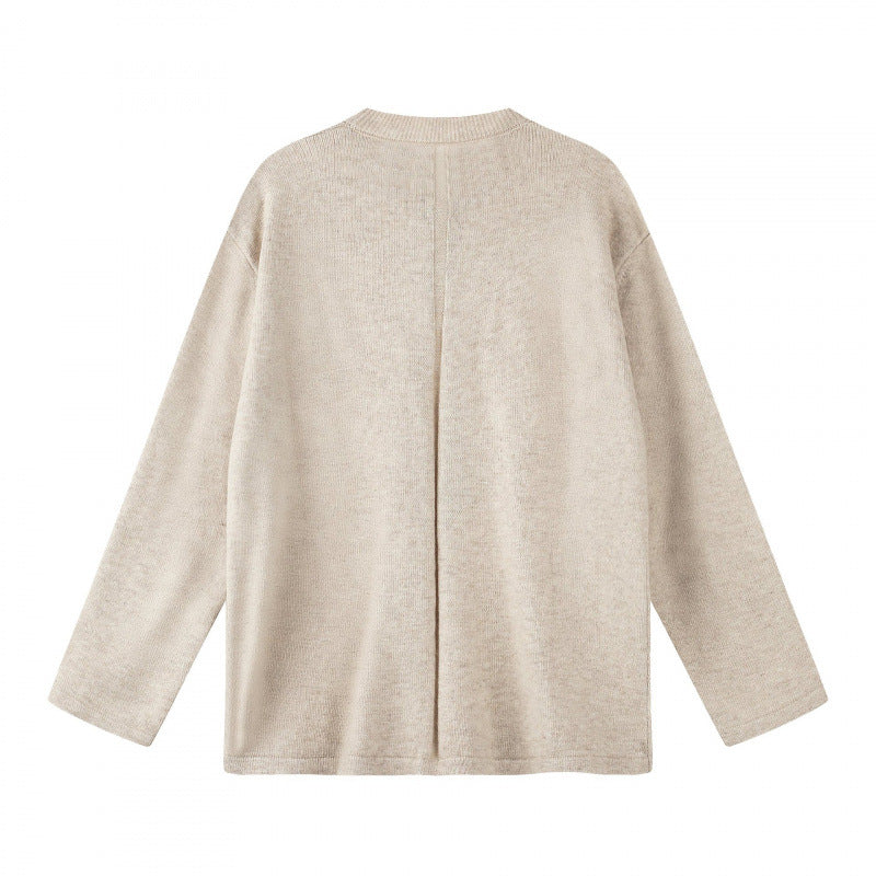 Unisex Oversize knit sweater with Henley button placket, straight hem and light texture Shop Velvia