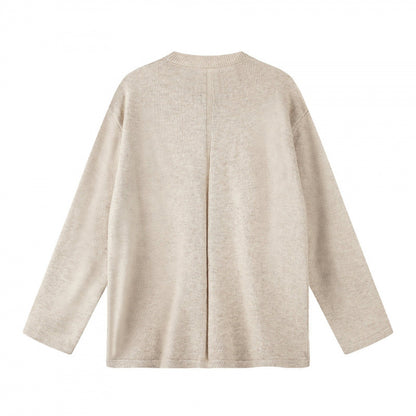 Unisex Oversize knit sweater with Henley button placket, straight hem and light texture Shop Velvia