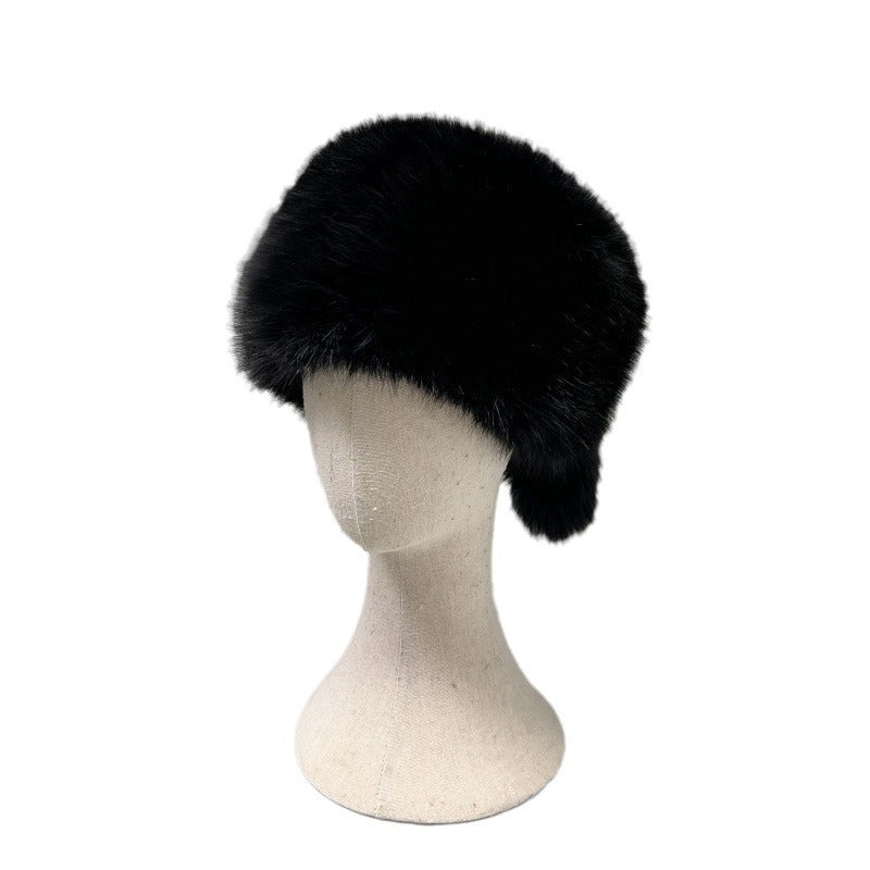 Women’s plush faux fur trapper hat with earflaps and decorative tail Shop Velvia
