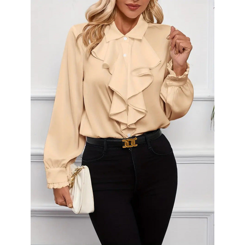 Women’s blouse with refined ruffle details and elegant sleeves