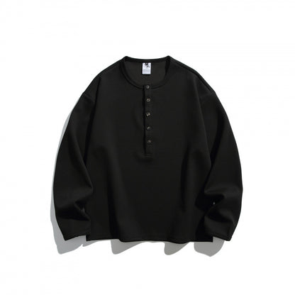Unisex waffle texture Henley shirt with button placket and oversized fit Shop Velvia