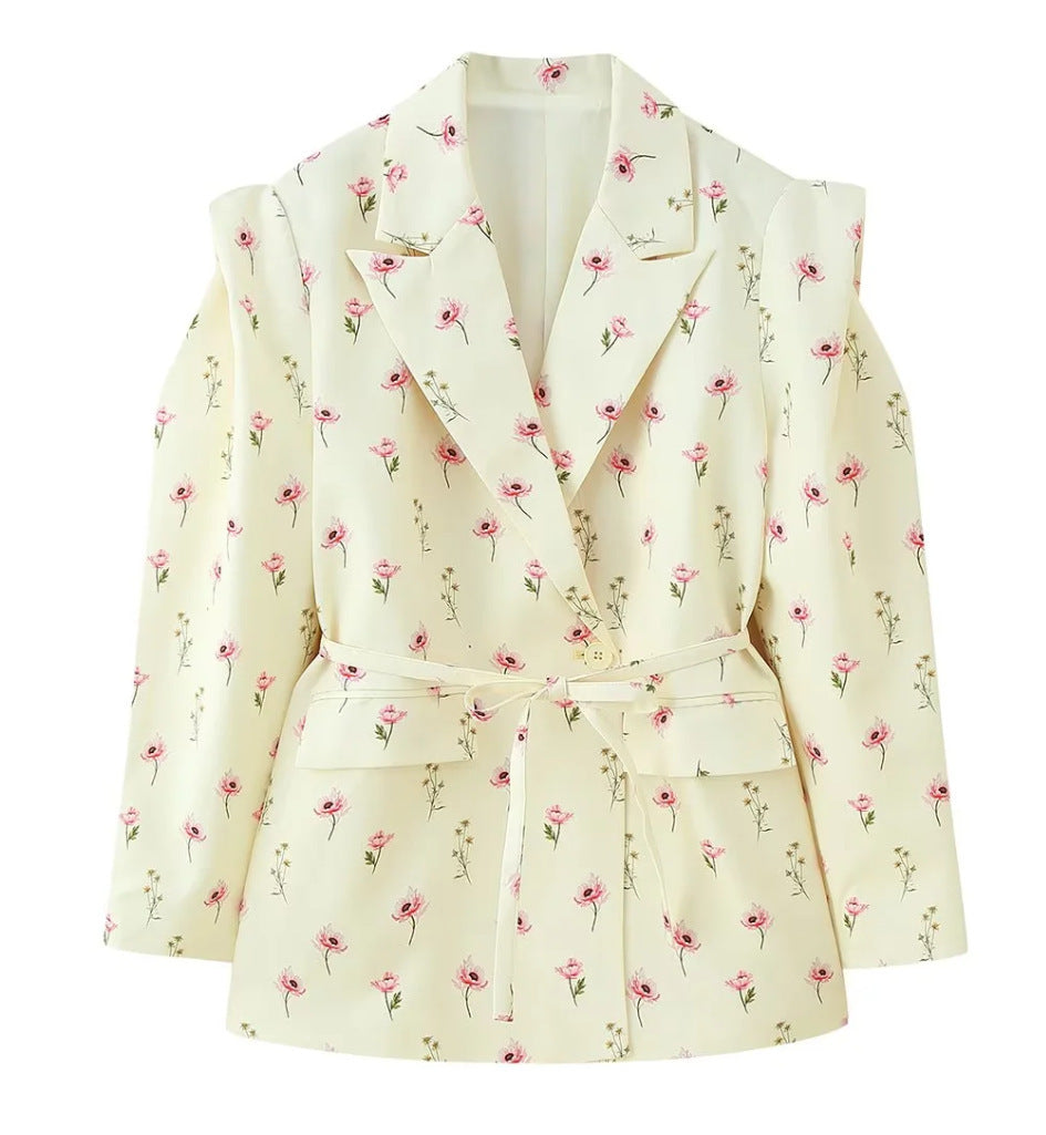 Women's blazer with shoulder cutouts, belted waist and single button closure Shop Velvia