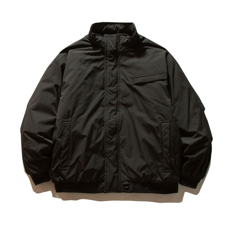 Unisex Boxy-padded transition jacket with high stand-up collar and utility pockets Shop Velvia