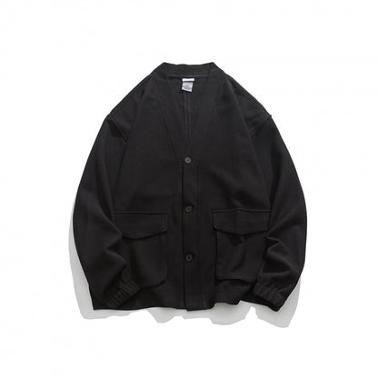 Unisex Oversize cardigan with large flap pockets and waffle texture Shop Velvia