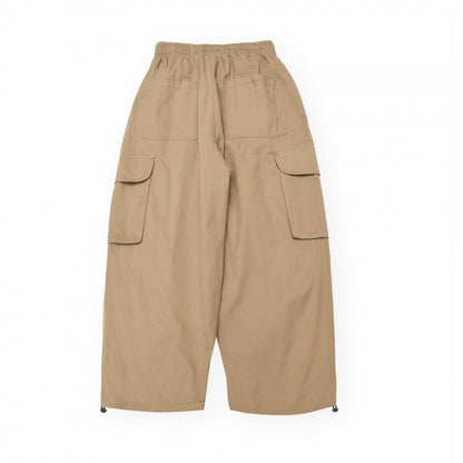 Unisex Wide Cargo Pants in Cropped Utility Style with Drawstring Waistband and Large Flap Pockets Shop Velvia