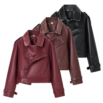 Ladies short cut biker jacket made of faux leather with asymmetrical front and waist belt Shop Velvia