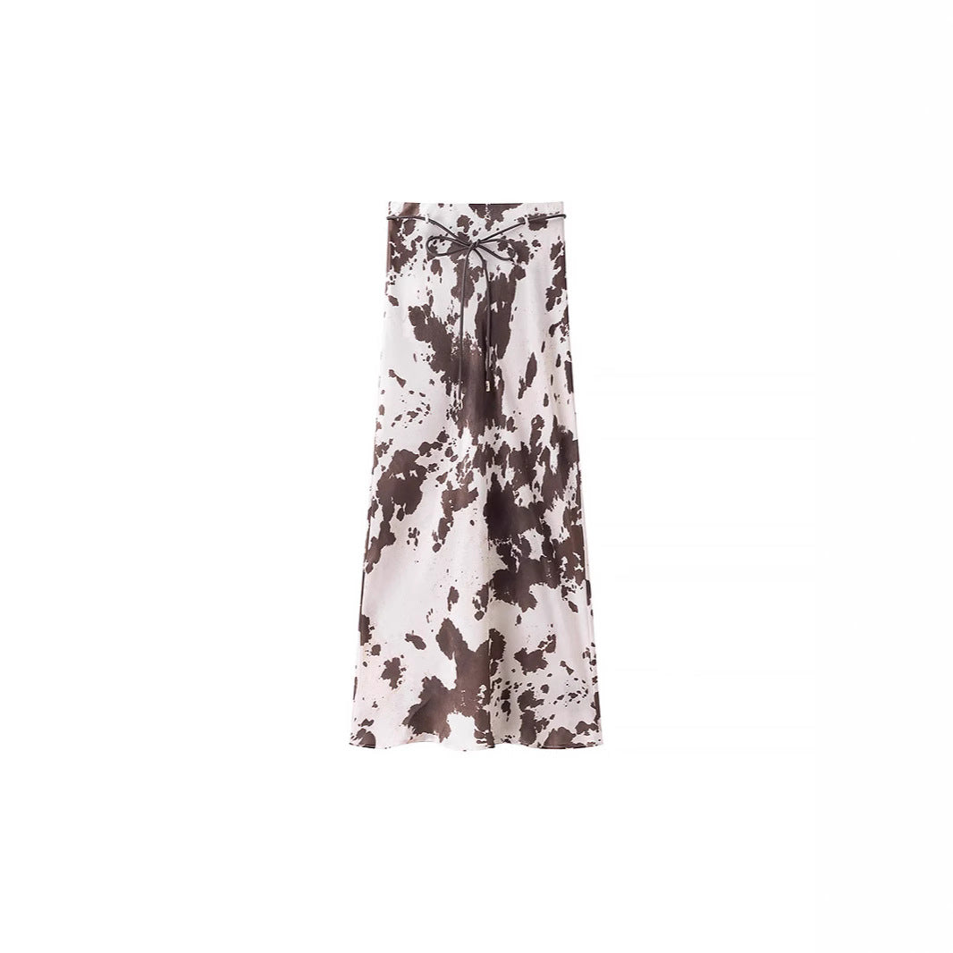 Women's loosely cut shirt blouse with cow spot print and concealed button placket Shop Velvia