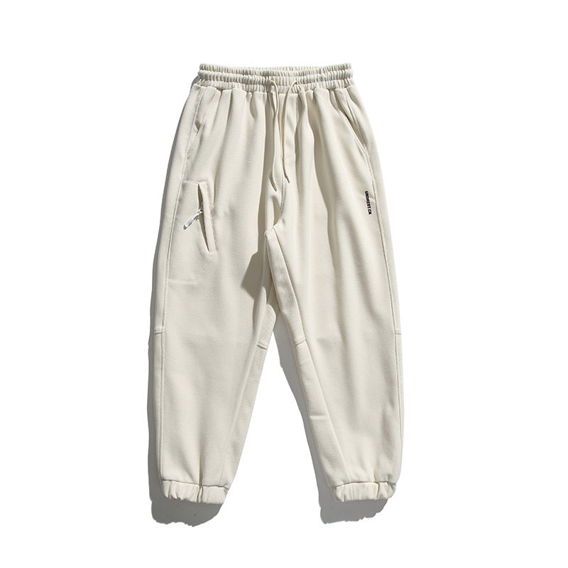 Unisex wide jogging pants in oversized cut with elastic waistband, knee panel and ribbed cuffs Shop Velvia