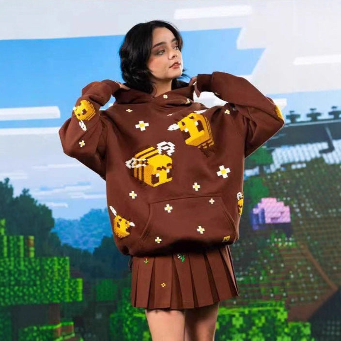 Unisex hoodie with knitted pixel bee design and attached kangaroo pocket Shop Velvia
