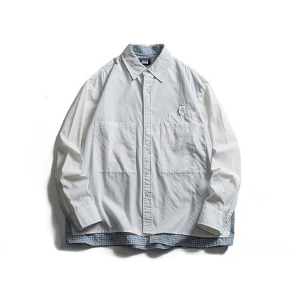 Men's layered look overshirt with patch front pockets, loose fit and checked underlay Shop Velvia