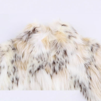 Women Short Cut Faux Fur Jacket with Stand Collar and Voluminous Faux Fur Shop Velvia