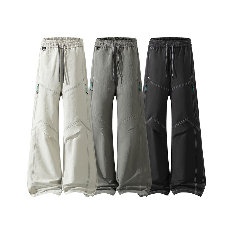 Men's Wide Cargo Pants with Drawstring Waistband, Utility Seams and Zip Pockets Shop Velvia