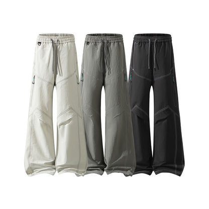 Men's Wide Cargo Pants with Drawstring Waistband, Utility Seams and Zip Pockets Shop Velvia