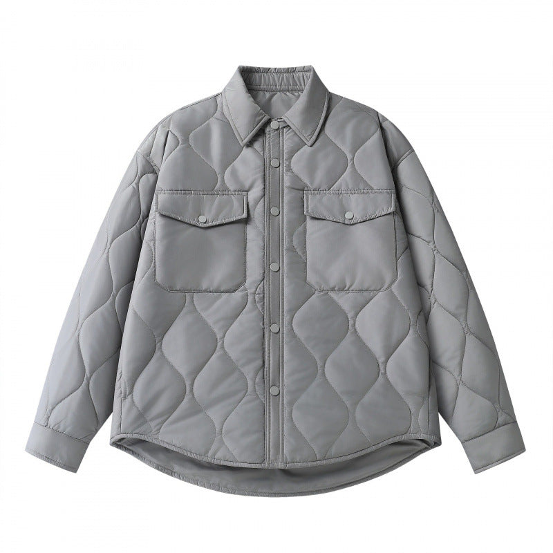 Unisex Padded Quilted Shirt Jacket with Flap Pockets and Curved Hem Shop Velvia