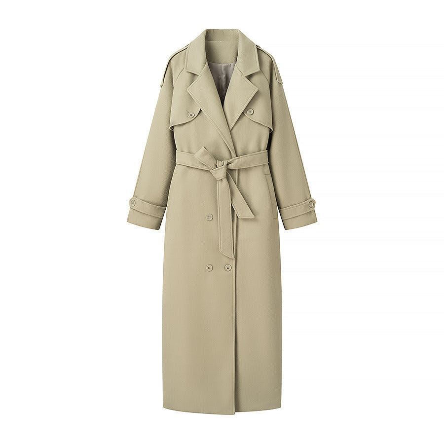 Women's maxi-length wool blend trench coat with belted tie, double-breasted button placket and shoulder epaulettes Shop Velvia