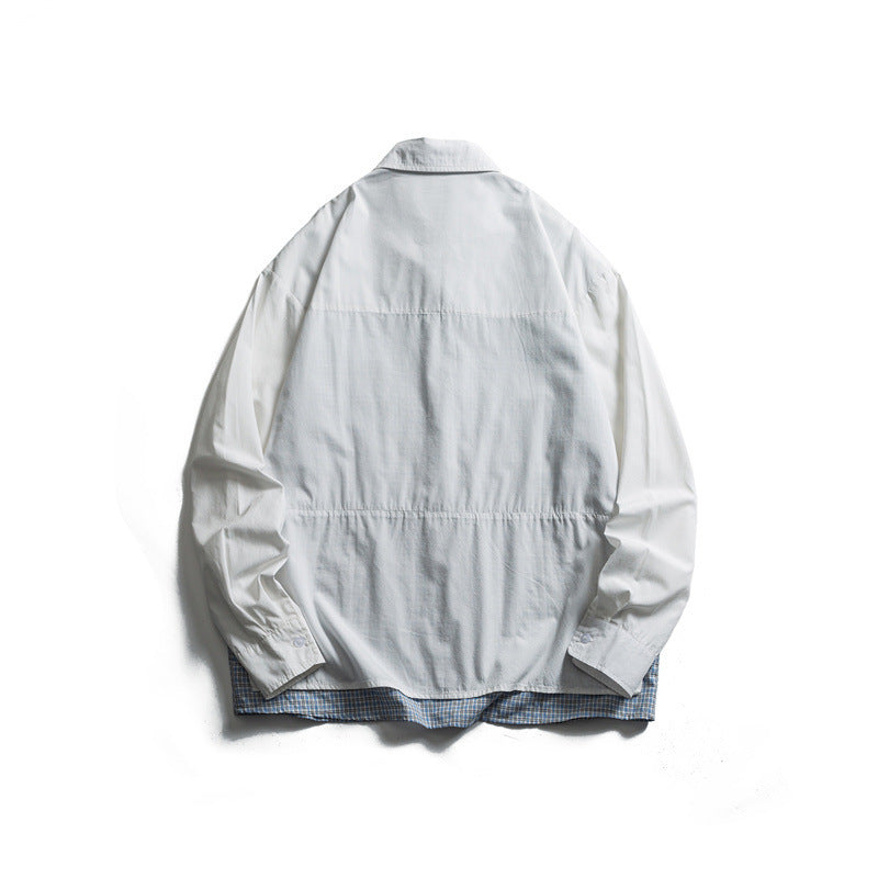 Men's layered look overshirt with patch front pockets, loose fit and checked underlay Shop Velvia