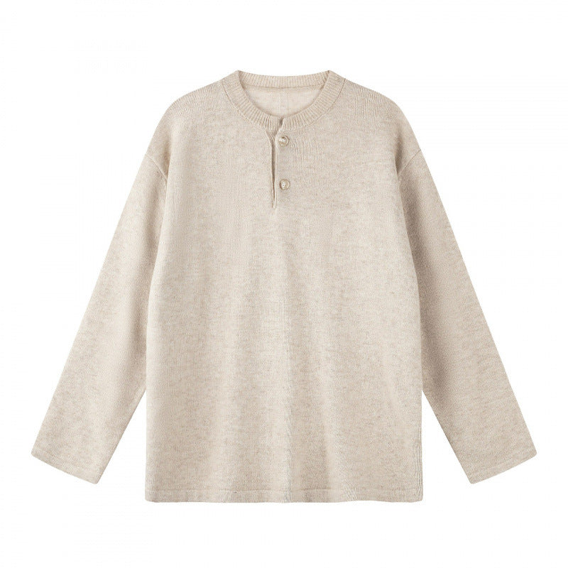 Unisex Oversize knit sweater with Henley button placket, straight hem and light texture Shop Velvia