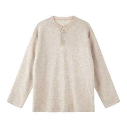 Unisex Oversize knit sweater with Henley button placket, straight hem and light texture Shop Velvia