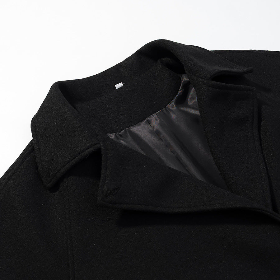Ladies long coat in a minimalist cocoon cut made of a wool blend with double-breasted button placket Shop Velvia