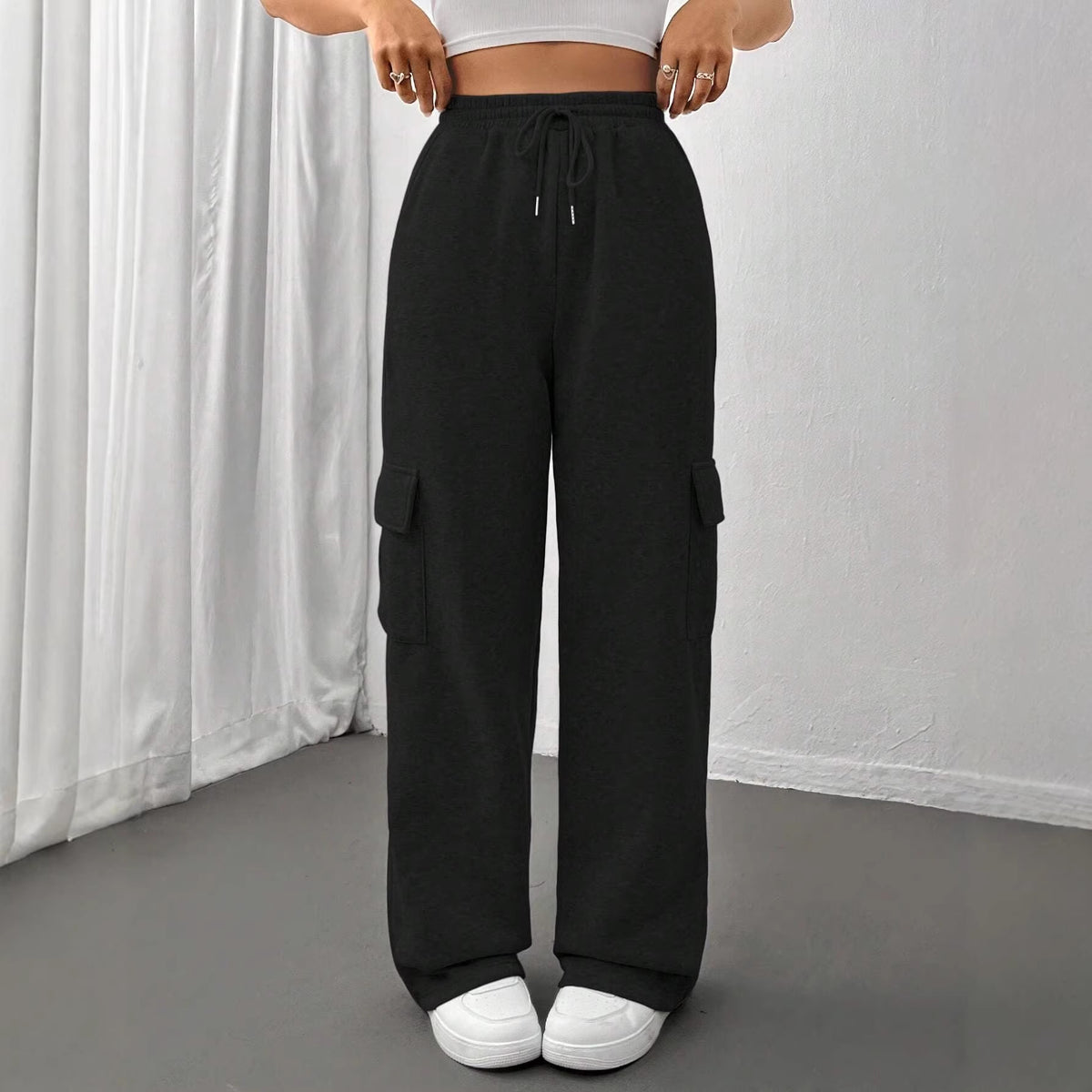Ladies cargo jogging pants with high elastic waistband, drawstring, and wide leg Shop Velvia