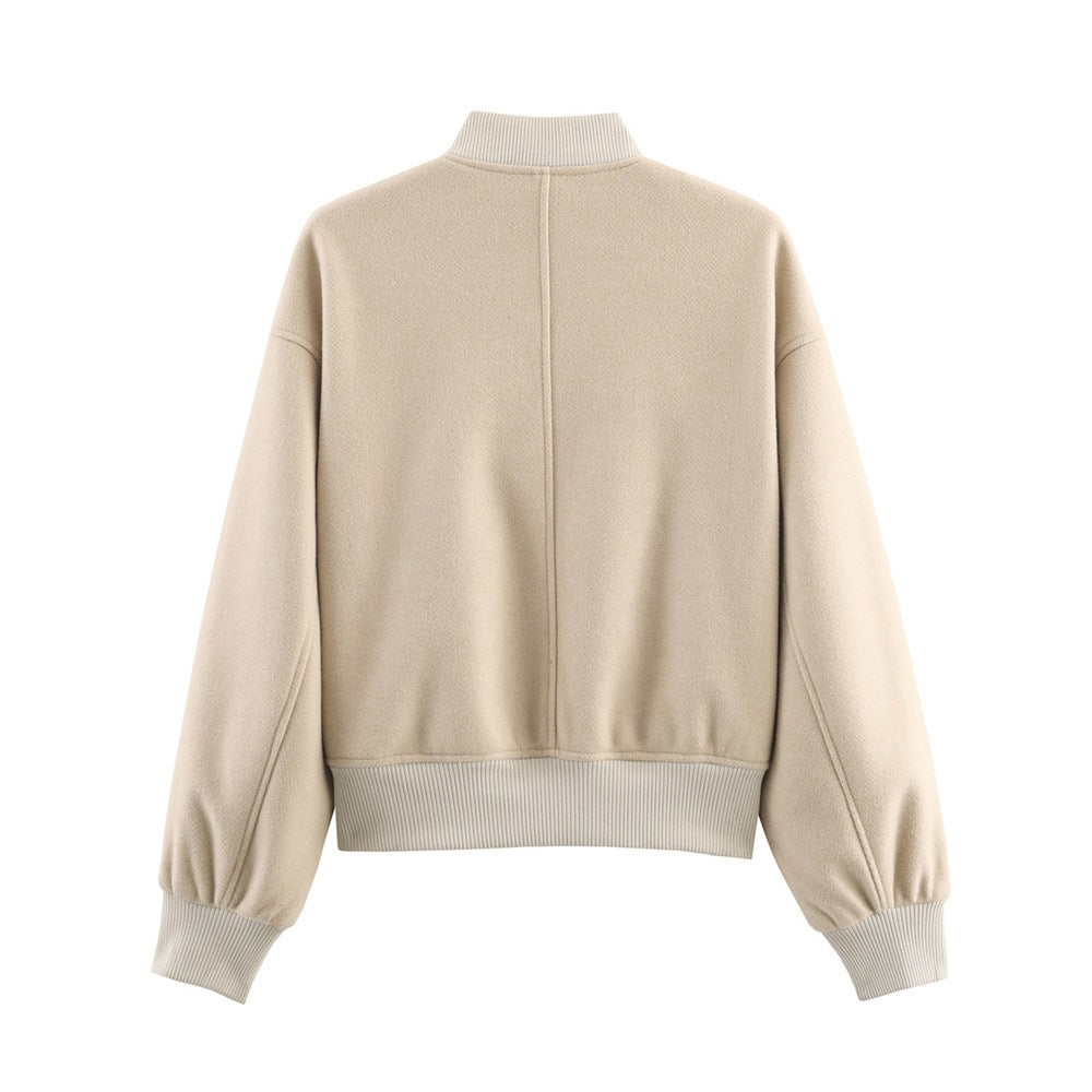 Ladies short boxy bomber jacket with ribbed collar, snap button closure, and pockets Shop Velvia