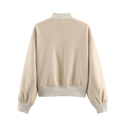 Ladies short boxy bomber jacket with ribbed collar, snap button closure, and pockets Shop Velvia