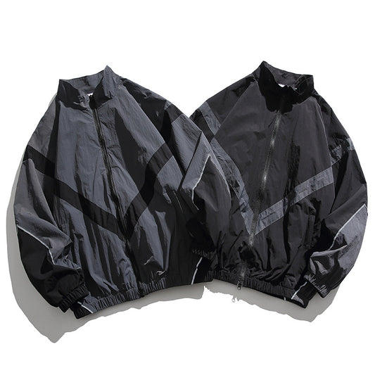 [Unisex] Oversize technical wind and rain jacket with stand-up collar, reflective piping, and elastic hem Shop Velvia
