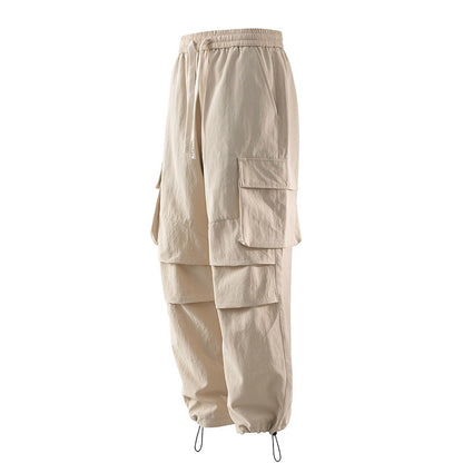 Men's cargo pants with elastic waistband, layered detail and zip hem Shop Velvia