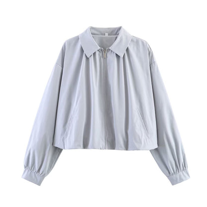 Women's cropped blouse with shirt collar, front zipper and gathered sleeve cuffs Shop Velvia