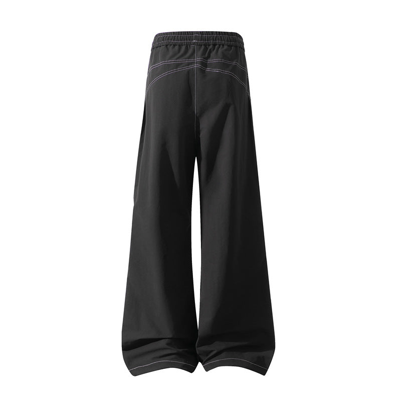 Men's Wide Cargo Pants with Drawstring Waistband, Utility Seams and Zip Pockets Shop Velvia