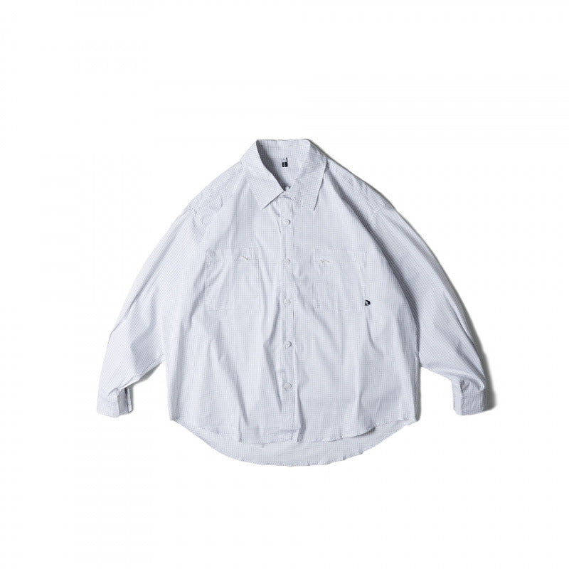 Unisex Oversize-checkered Shirt with rounded hem and appliquéd chest pockets Shop Velvia