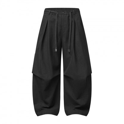 Unisex wide layered pants with balloon-shaped silhouette, high waist and drawstring Shop Velvia