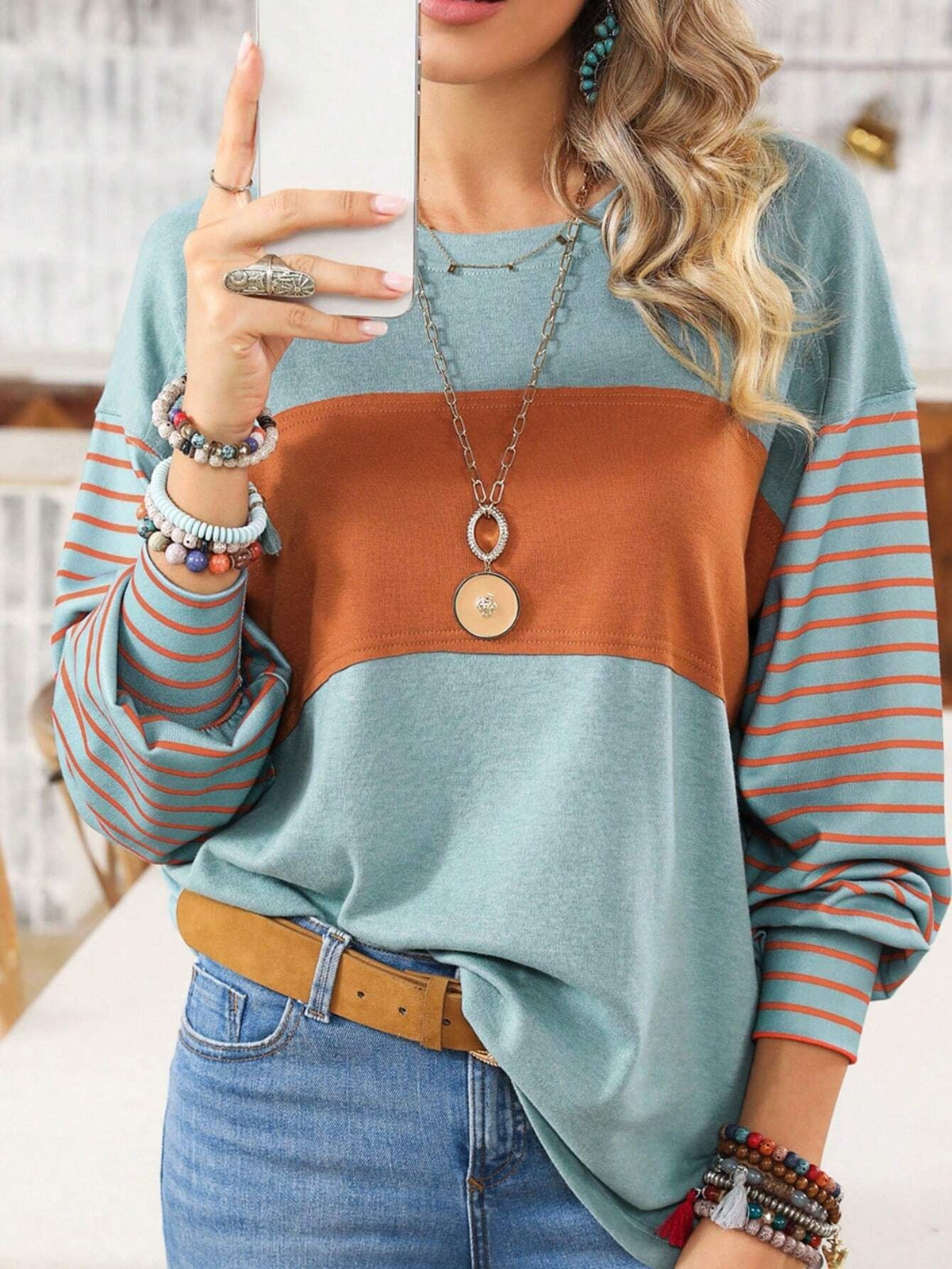 Women's Loose Colorblock Sweatshirt with Striped Sleeves and Round Neck Shop Velvia